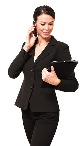 Businesswoman talking on the phone while holding a tablet