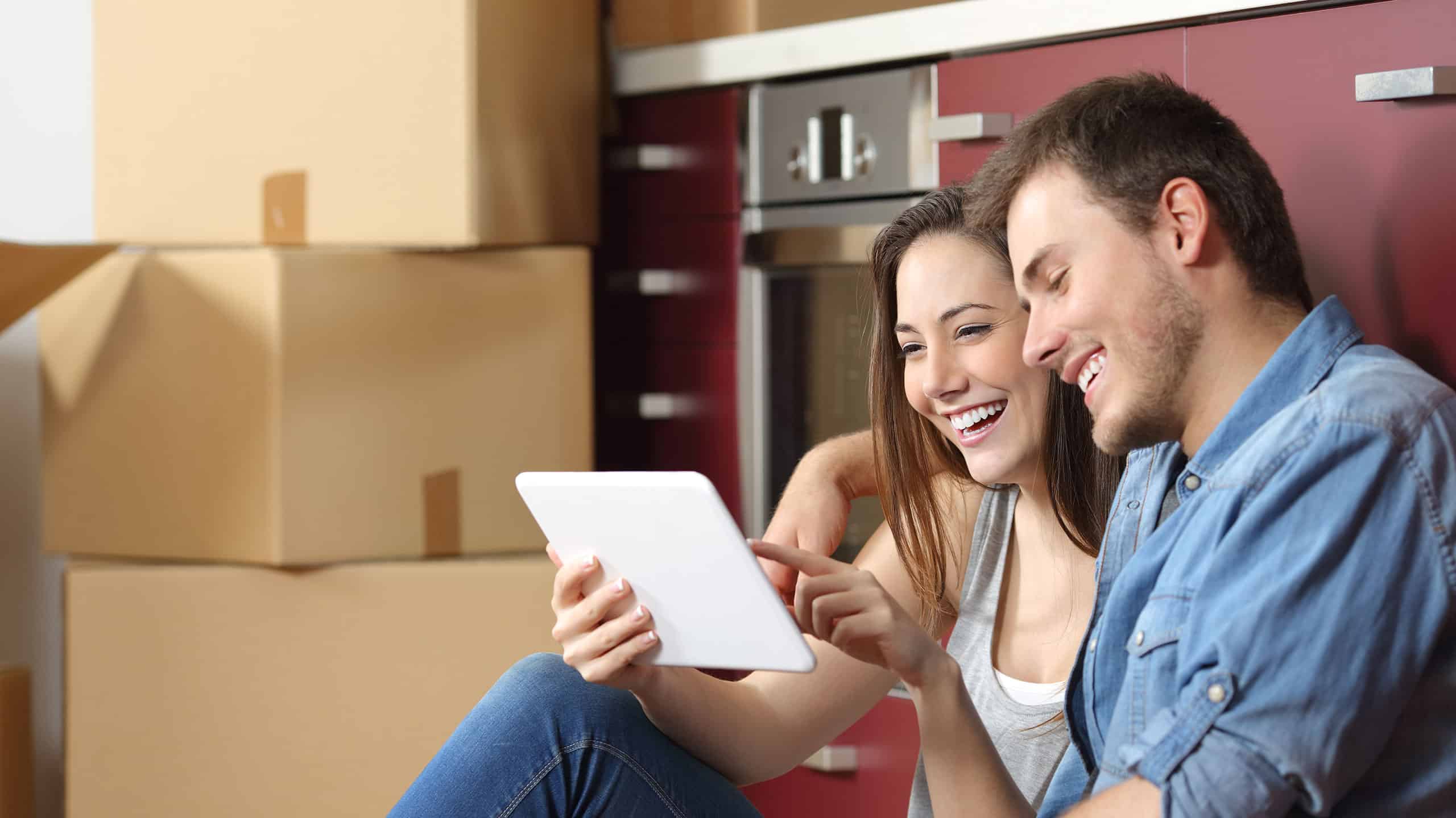 Couple reviewing their finances together at home